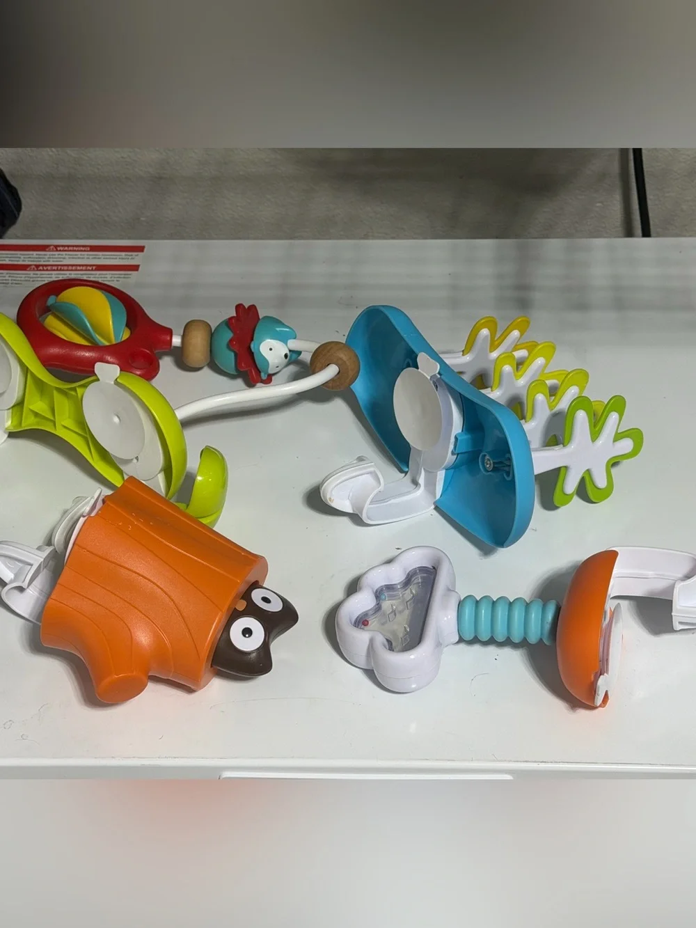 Skip-hop activity center replacement toys